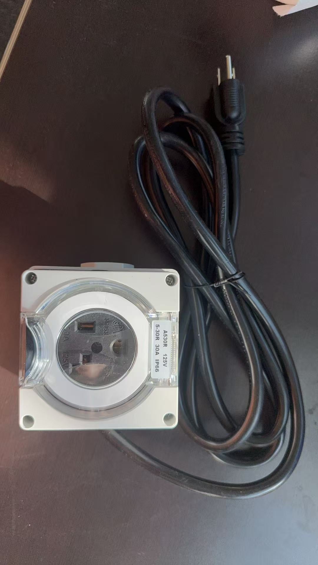 110V 30A NEMA power adapter cord for converting 5-30R outlet to 5-15P household plug.