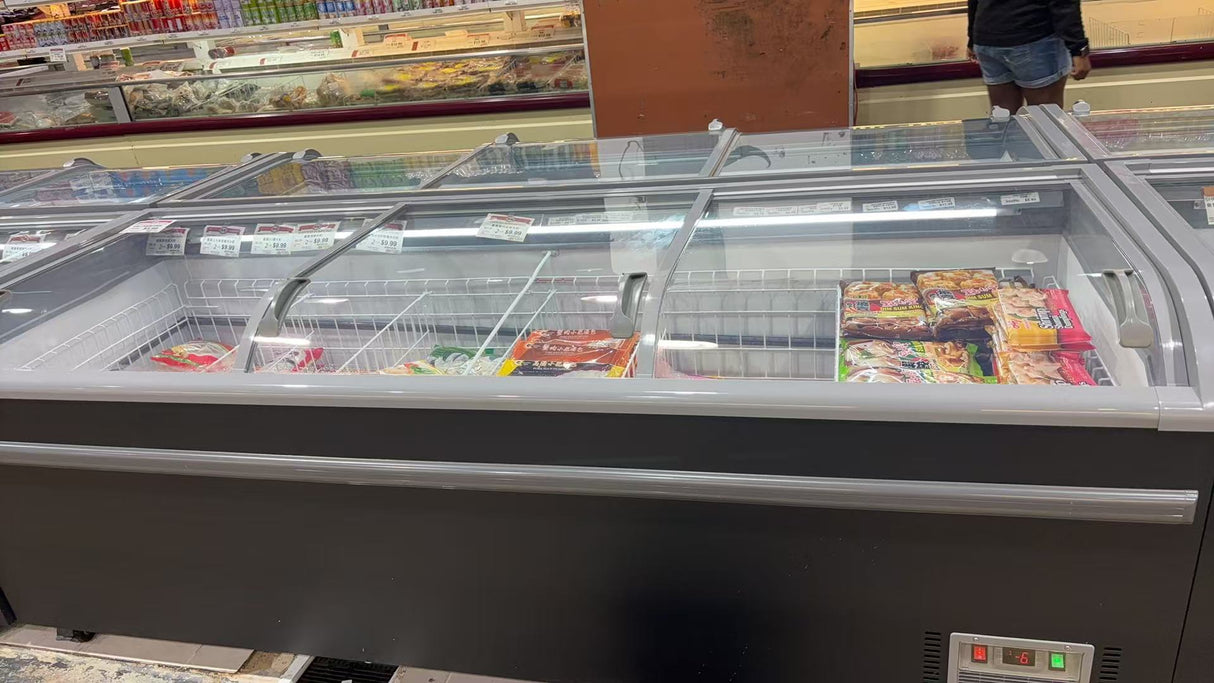Frozen food display case with various items inside, likely in a supermarket or store.