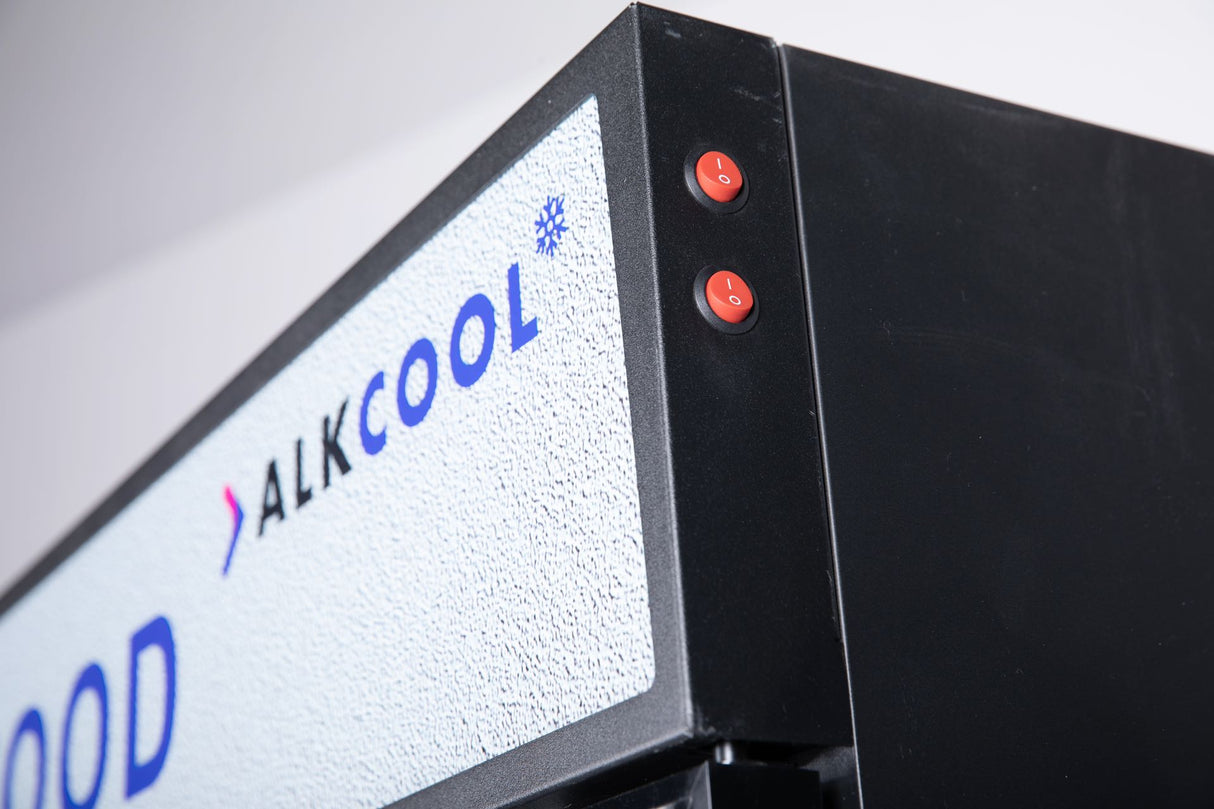 Black merchandiser freezer with self-closing doors and digital temperature controls