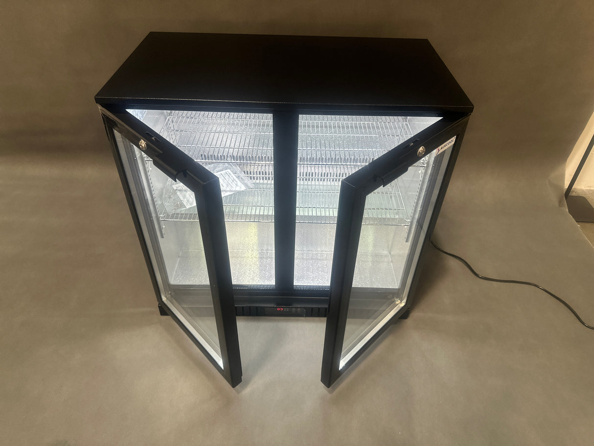 Rear view of ALKCOOL refrigerator showing compressor and ventilation area