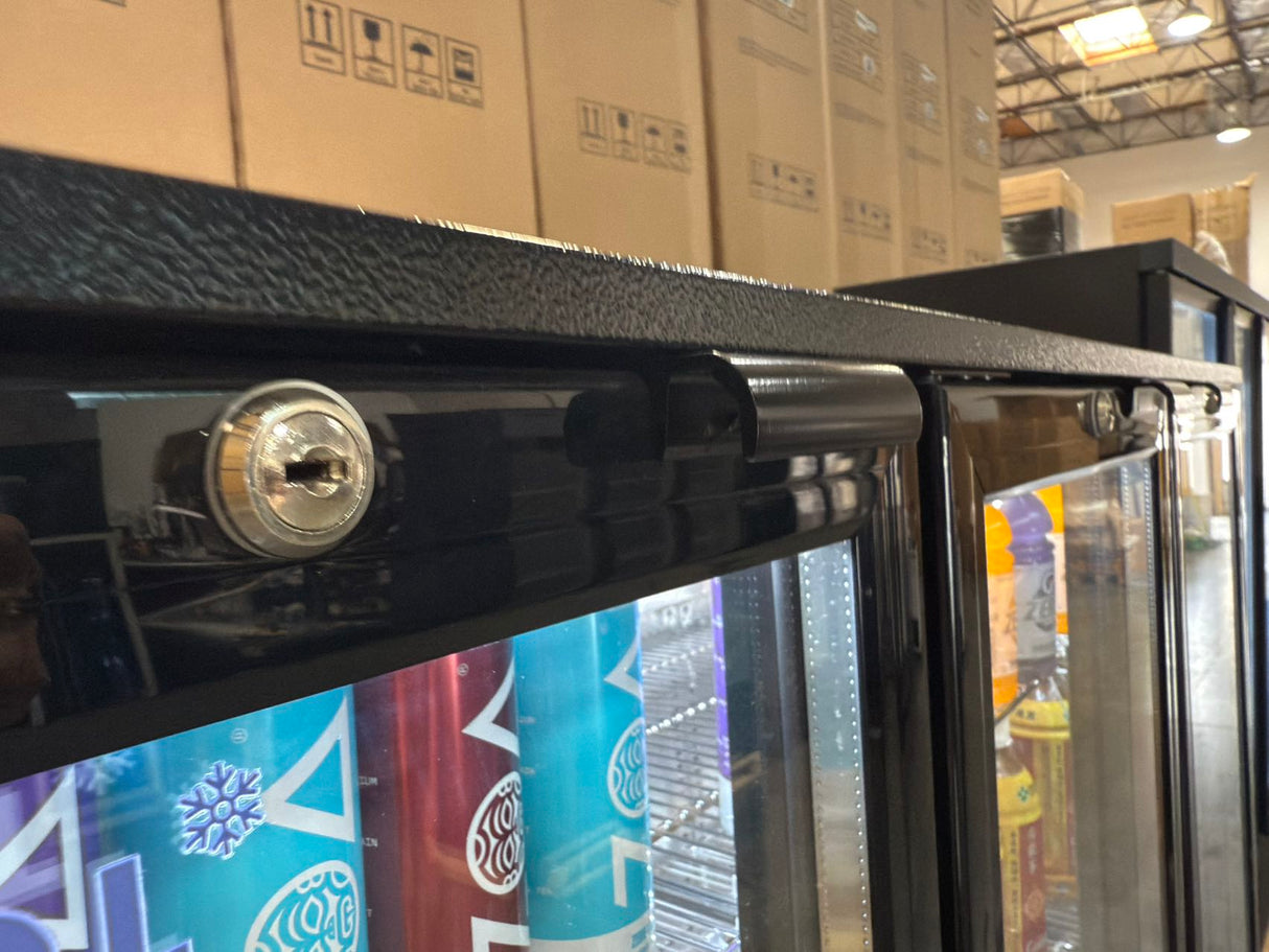 LG-330H refrigerator stocked with beverages in a bar setting.