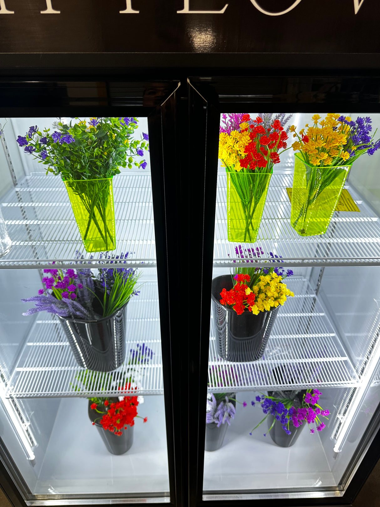 Front view of NAFCOOL GDR47H Floral Cooler with bright LED lighting
