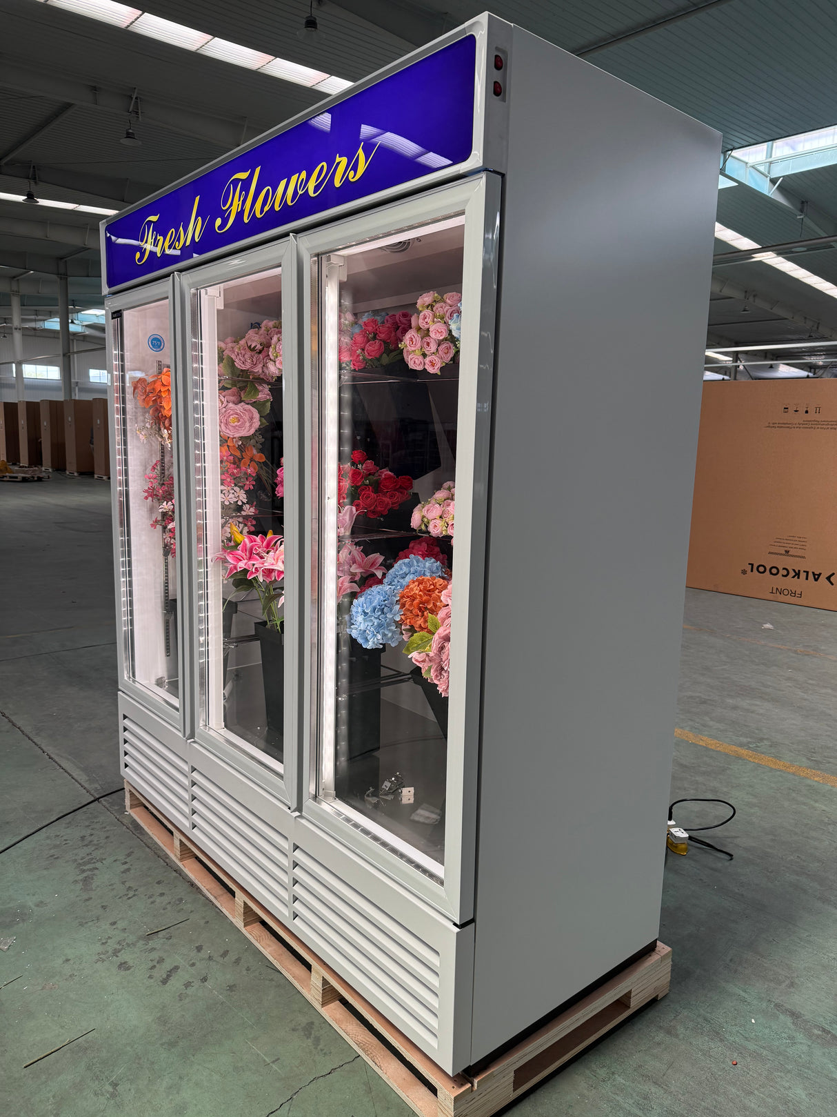 LED lighting and top branding panel on NAFCOOL floral display fridge