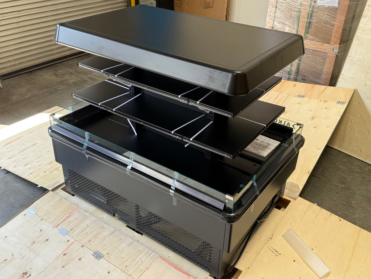 Retail refrigerated island unit with 3 levels of shelving and LED canopy lighting.