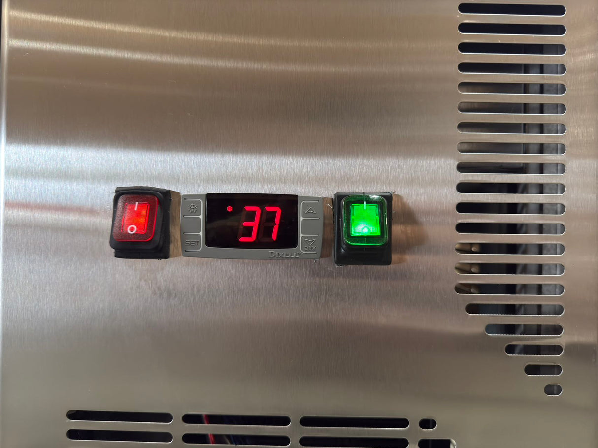 Top compartment of TG72 prep table filled with sandwich toppings in 15 third-size pans.