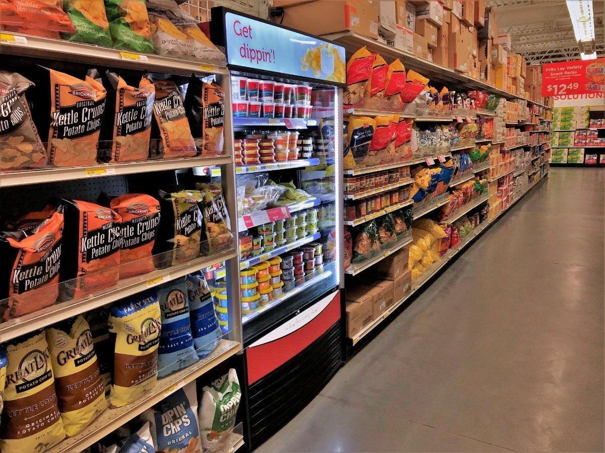 Commercial open-air refrigerator with LED canopy and open front access