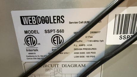 Web Coolers product label with model number SSPT-S60 on a metallic surface.