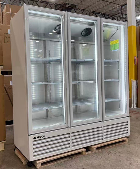 Three-door commercial freezer on a pallet in an indoor setting