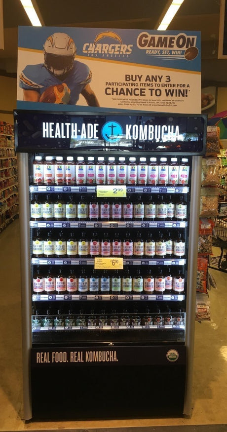 Heavy-duty black merchandiser fridge with full-length glass doors