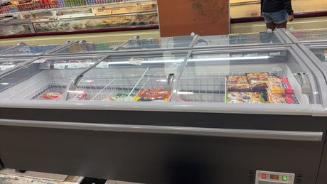 Frozen food display case with various items inside, likely in a supermarket or store.