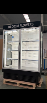 Bloom Flowers display freezer on a pallet with 'Bloom Flowers' branding.