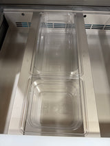 Stainless steel refrigerator with two clear plastic drawers inside