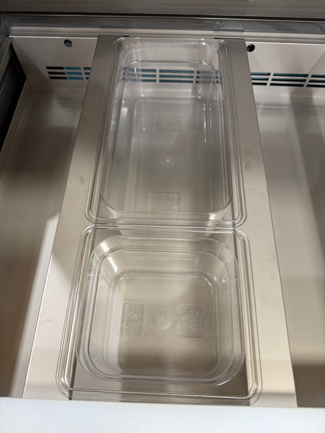 Stainless steel refrigerator with two clear plastic drawers inside
