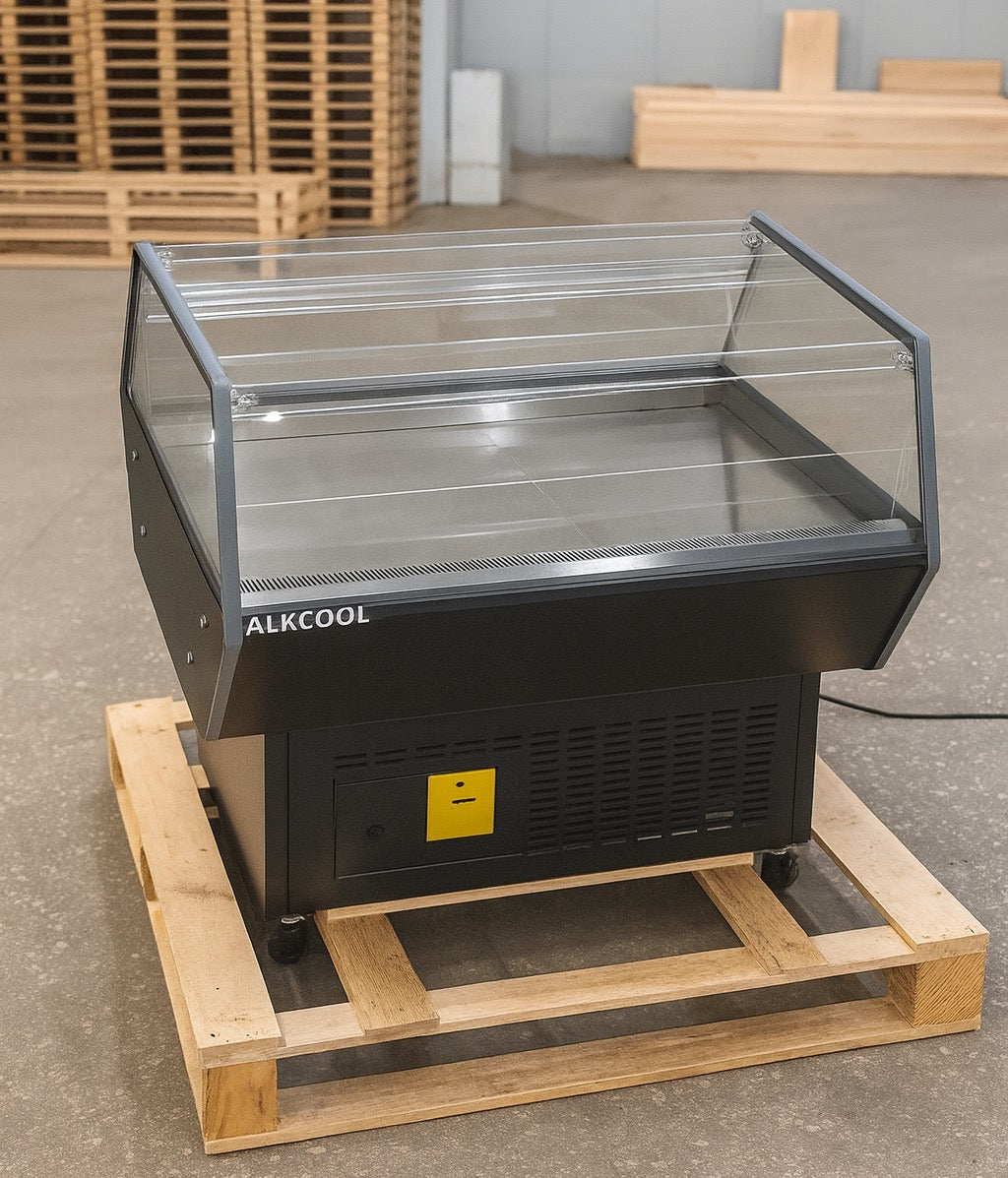 Cold display case on a wooden pallet with 'ALKCOOL' branding in an indoor setting.