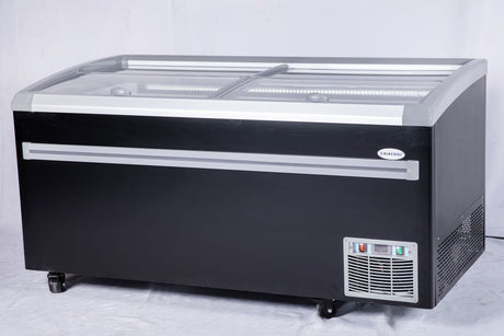 White commercial glass top freezer featuring curved sliding glass doors and rear defrost drain