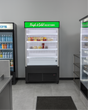 Refrigerated display case with 'Fresh & Cold Selections' sign in a store setting.