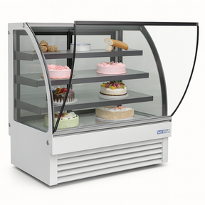 Display case with various cakes and pastries on a white background