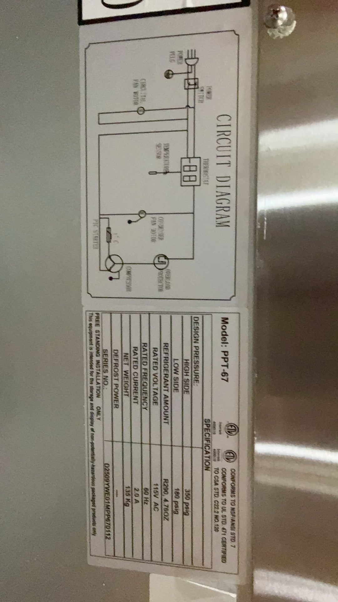 Circuit diagram label on a metallic surface