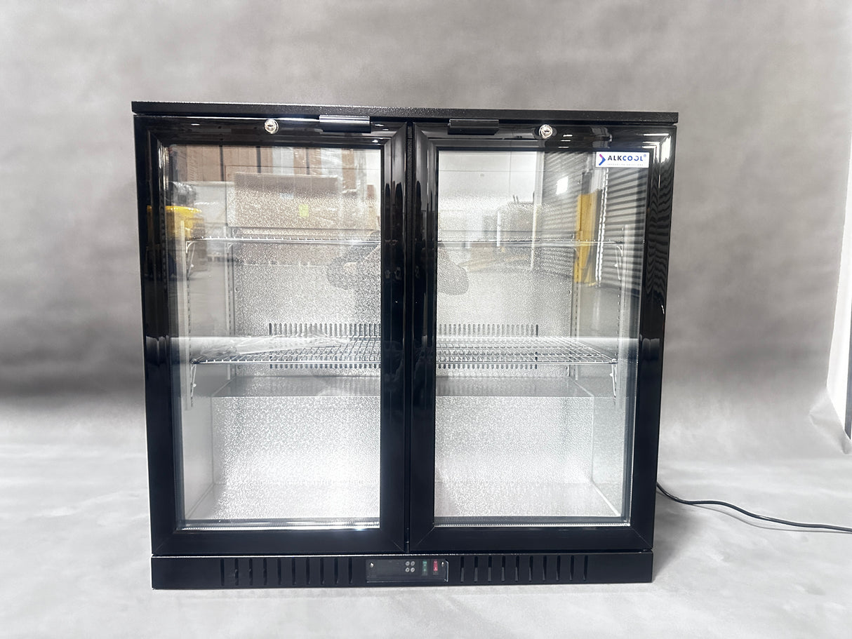 Spacious interior of ALKCOOL refrigerator with adjustable shelving for versatile storage