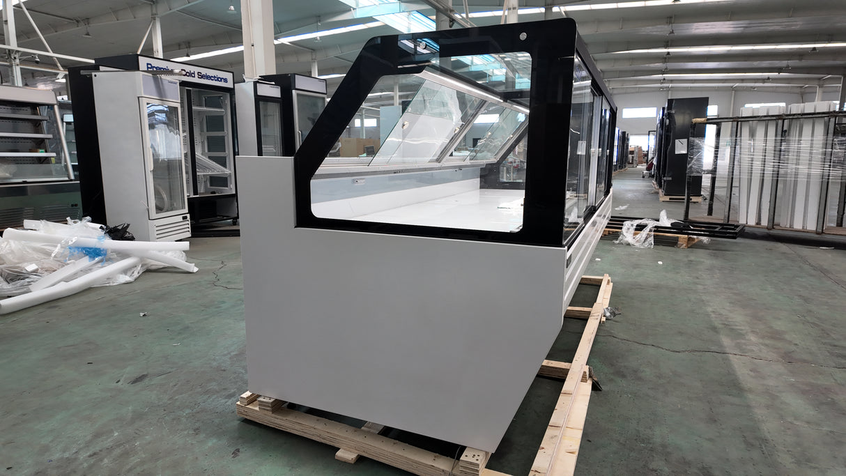 Bakery refrigerated display case with LED canopy lighting and sliding glass doors.