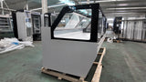 Bakery refrigerated display case with LED canopy lighting and sliding glass doors.