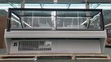 Bakery display refrigerated unit with LED lighting and tempered glass.