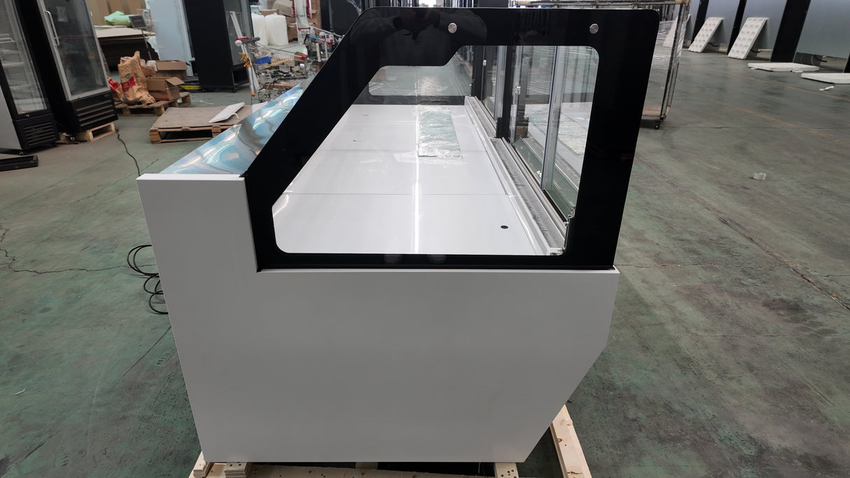 102-inch commercial refrigerated case with silver anodized glass hardware.
