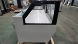 102-inch commercial refrigerated case with silver anodized glass hardware.