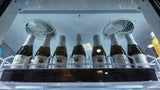 Backlit exterior top panel on NAFCOOL TGDR70 Black Swing Glass Cooler attracting customer attention