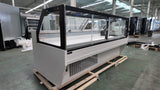 Energy-efficient refrigerated display case for deli with air sweep cooling and modular coil.